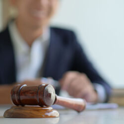 Concept of justice, Hammer and the lawyer are giving legal advice.