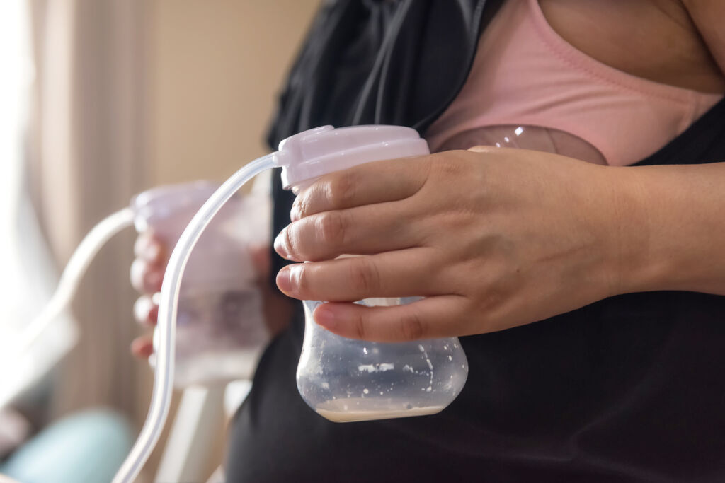 Mother pumping milk
